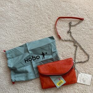 Hobo bags Grenadine Orange Red Leather crossbody clutch.